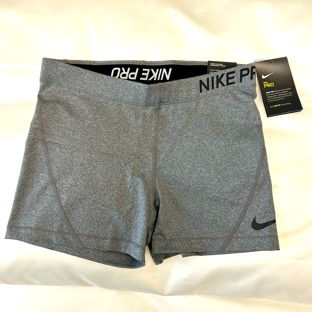 NWT Nike Pro Tight Fit shorts. 3 inch length. Grey w/black. Size large.Brand new